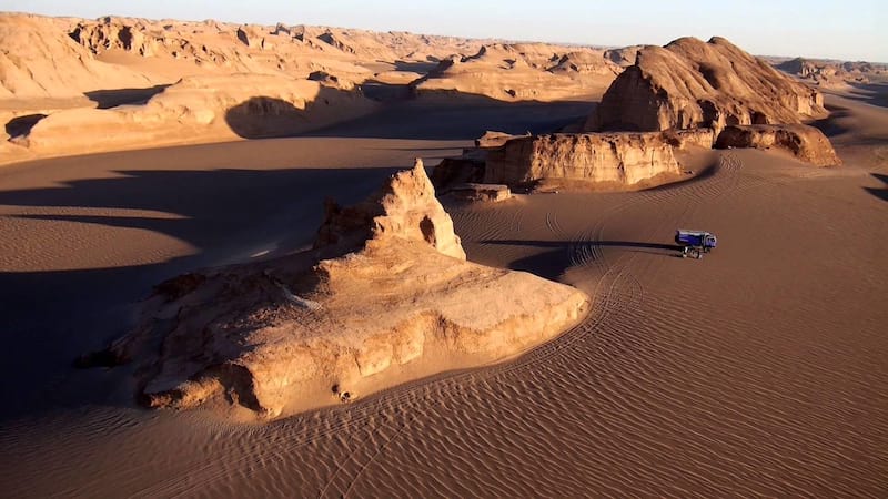 shahdad desert with astonish kalut and safari cars in near kerman
